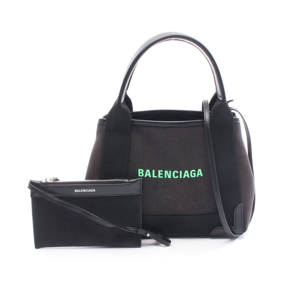 Balenciaga Navy Xs 2Way Black: Balenciaga Navy Hippopotamus Xs Handbag 2Way. Color: Black. Material: Canvas Leather. Size: 23/25 X 20 X 7 Cm. Handle: 37 Cm. Strap: 107-112 Cm. Includes: Shoulder Strap, Pouch.