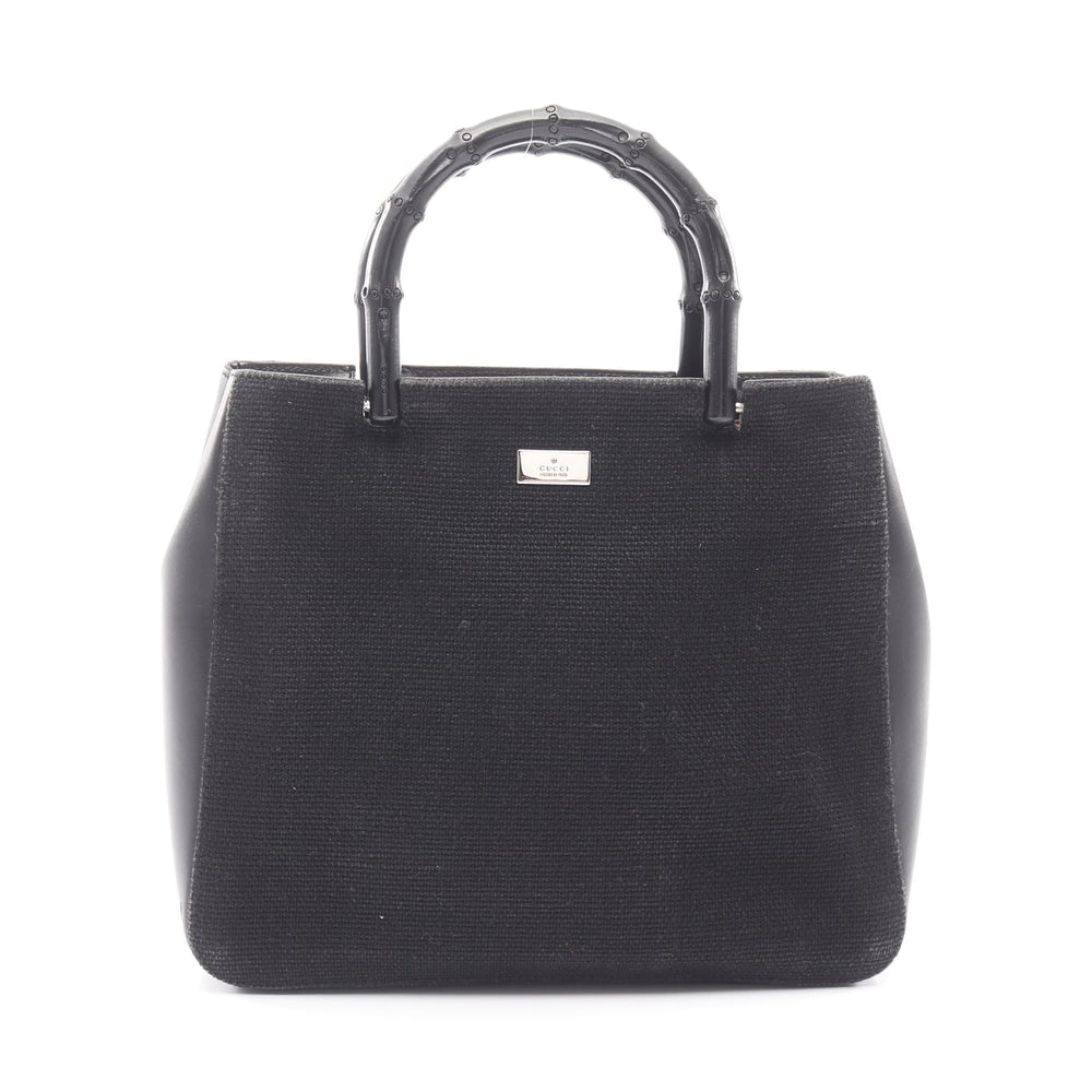 Gucci Bamboo Handbag Black: Gucci Bamboo Handbag. Color: Black. Material: Canvas Leather. Size: 23/26 X 22 X 7.5 Cm. Handle: 30 Cm.