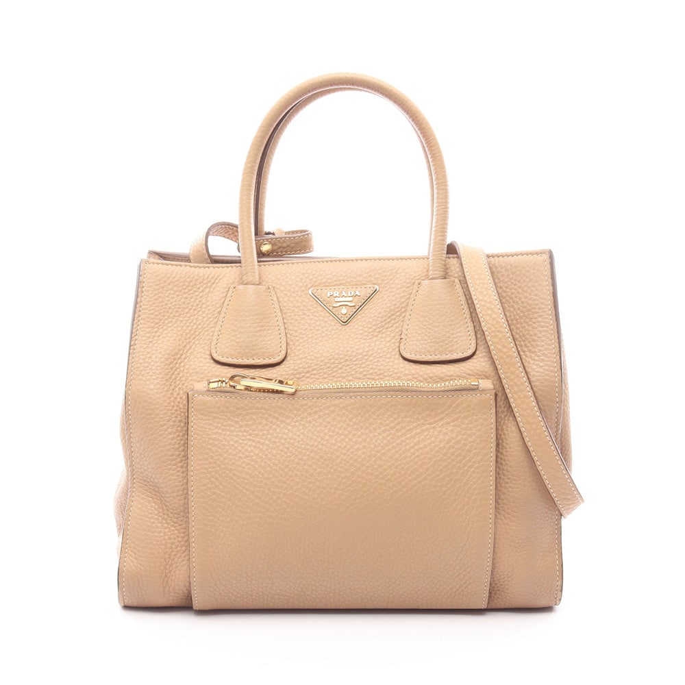 Prada Vit Daino Beige 2Way Handbag: Authenticated genuine Prada Vit Daino 2WAY handbag in beige leather with Prada logo plate, model BN2626. Includes shoulder strap and poignet. Approx. H25.5 x W29.5 top/30 base x D20 cm, strap 111-121