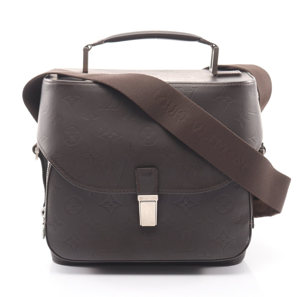 LV Charlie Camera Bag Dark Brown: Authentic and authenticated Louis Vuitton Charlie Camera bag Monogram Glace shoulder bag in dark brown leather. Model M46510, product no. AS1011. Approx. 21H x 23W x 4/12.5D cm with max 138 cm strap.