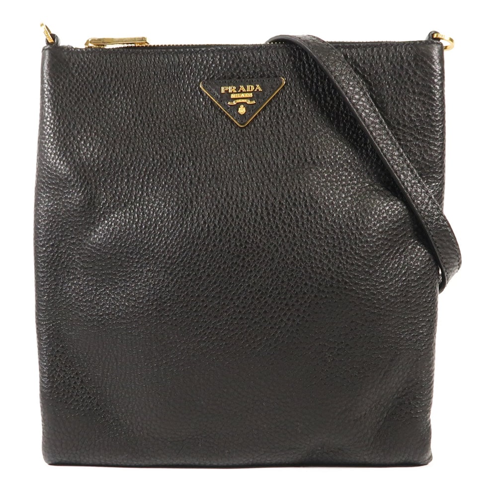 Prada BT0998 Shoulder Bag Black: Authenticated genuine Prada shoulder bag in black calfskin leather with gold-tone hardware. Includes storage bags and guarantee. Approx. W23 x H25.5 x D1.5 cm; shoulder 129-135.5 cm.