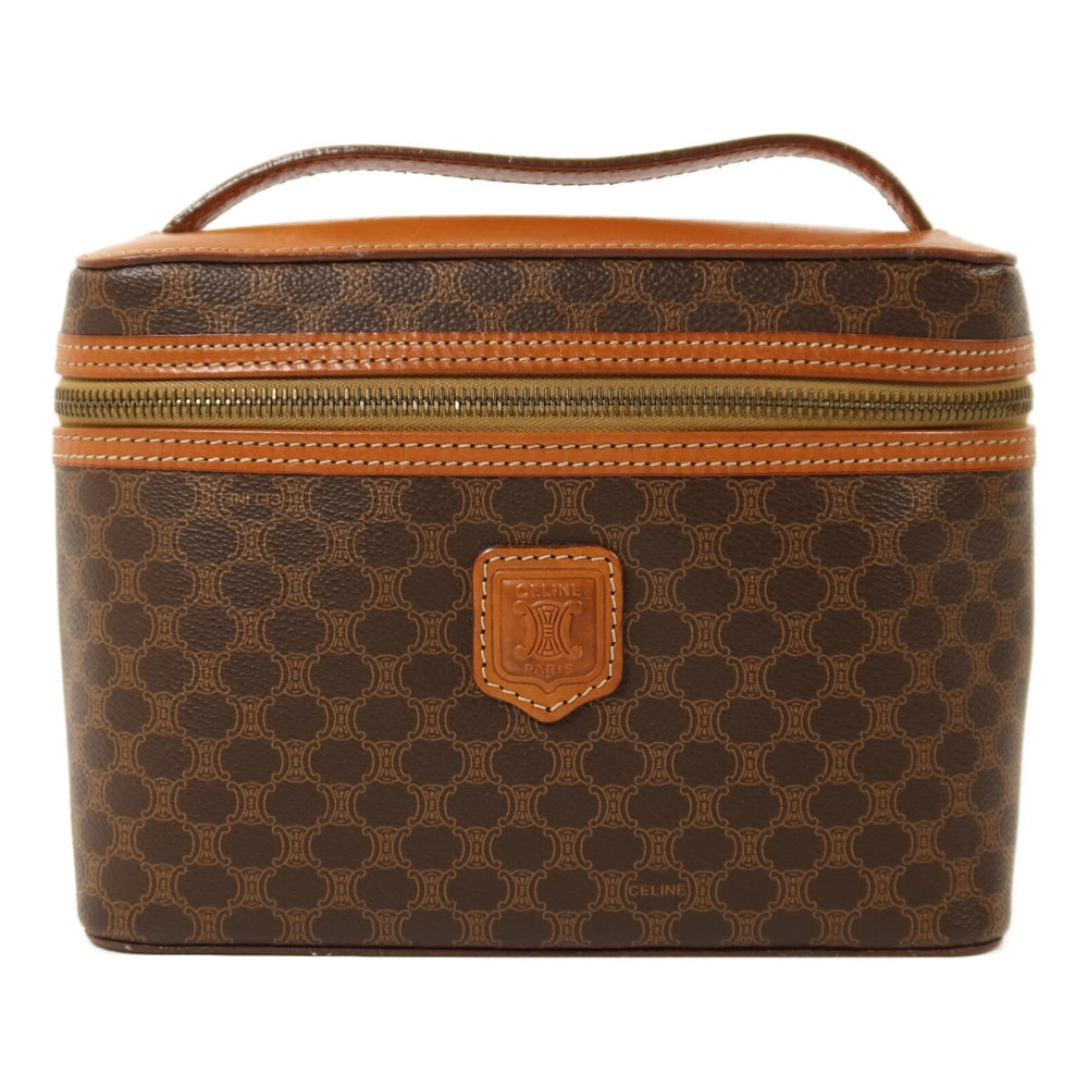 Celine Vintage Brown Handbag: Authentic and authenticated Celine Vintage handbag in brown calfskin. Product no. MC96. Approx. 21W x 15H x 7D cm with 19 cm handle. No accessories listed.