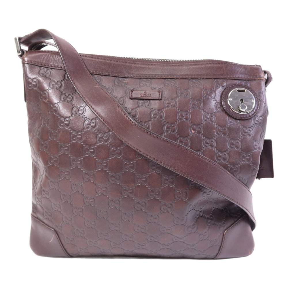 Gucci Calfskin Shoulder Bag Black: Authentic and authenticated Gucci shoulder bag in black calfskin. Product no. 001998. Approx. 34W x 32H x 1.5D cm with 125-135.5 cm strap. Includes clochette and key.