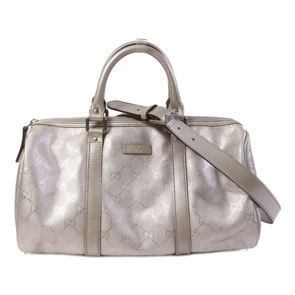 Gucci Silver Coated Canvas Boston Bag: Authentic and authenticated Gucci Boston bag 2 way shoulder bag in silver PVC coated canvas. Product no. 213317. Approx. 31.5W x 16H x 17.5D cm with 26.5 cm handle and 106-117 cm strap. Includes