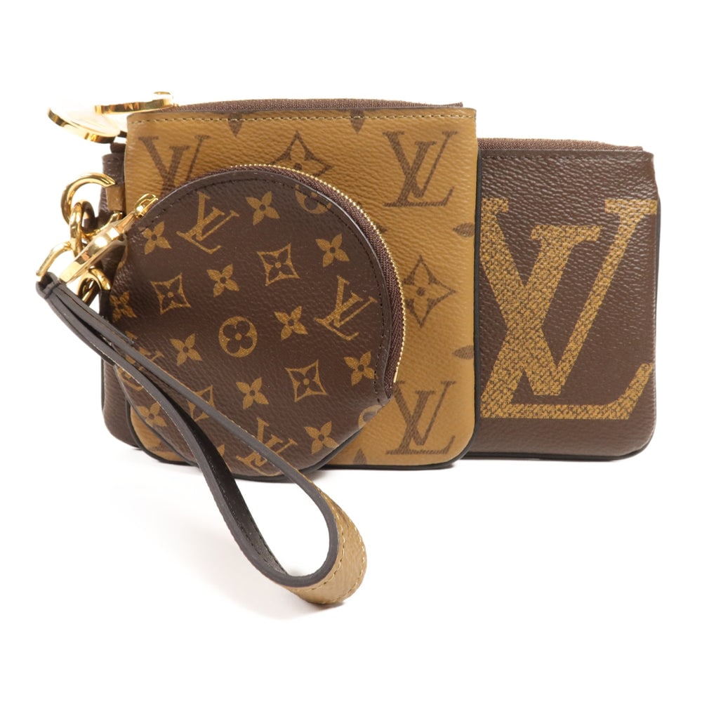 LV Pochette Trio Monogram Reverse: Authentic and authenticated Louis Vuitton Pochette Trio pouch in brown Monogram Reverse PVC coated canvas. Includes storage box, storage bags, and pouch. Approx. 19 x 10.5 x 1 cm.