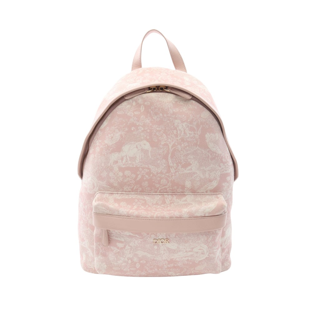 Dior Backpack Light Pink: Light pink canvas and leather Christian Dior all-over pattern backpack. Approx. 29 x 39 x 12 cm; straps 44-76 cm; handle 21 cm. Authentic and authenticated.