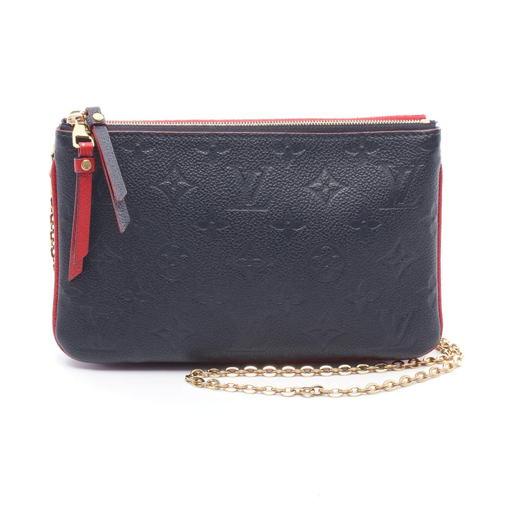 LV Pochette Double Zip Navy Red: Navy and red leather Pochette Double Zip Monogram Empreinte chain shoulder bag. Approx. 21 x 13 x 1/1 cm; strap 116 cm. Model M63916, product no. GI0240. Authentic and authenticated.
