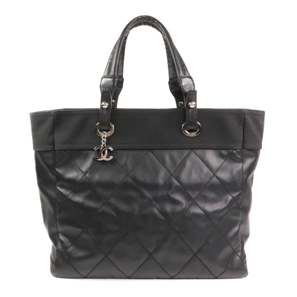 Chanel Tote Bag Calfskin Black: Black calfskin Chanel tote bag with hologram sticker. Approx. 36 x 30 x 14 cm; handle 47 cm. Product no. 16406843. Authentic and authenticated.