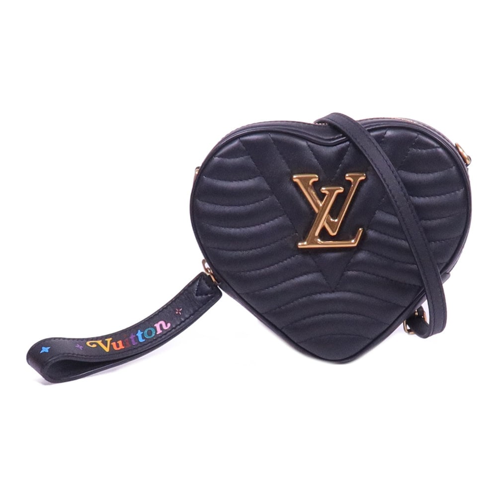 LV New Wave Heart Bag Black: Black calfskin New Wave Heart shoulder bag with storage bags and shoulder strap. Approx. 6-18 x 15 x 5 cm; strap 104-116 cm. Product no. NZ0169. Authentic and authenticated.