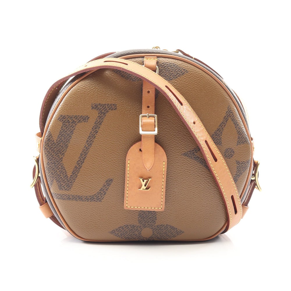 Louis Vuitton Boite Chapeau Souple: Brown monogram reverse PVC leather shoulder bag.