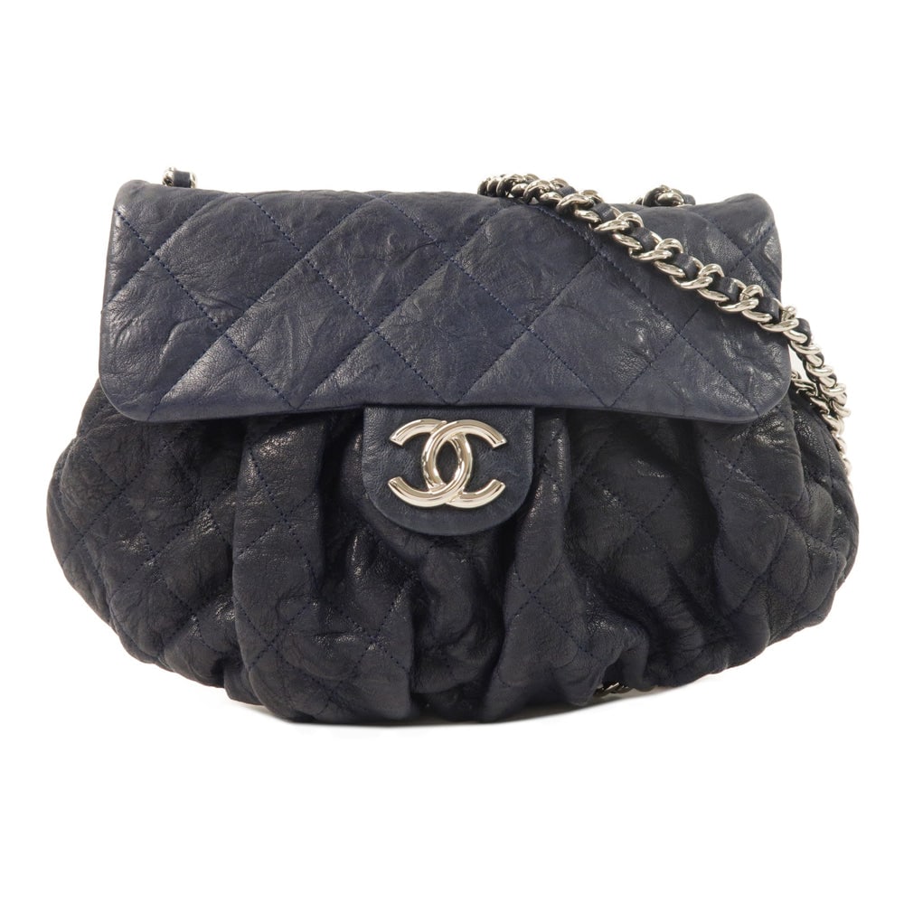 Chanel Blue Chain Shoulder Bag: Blue calfskin chain shoulder bag with SHW; includes storage bag hologram sticker and guarantee; W32 x H23 x D3 cm. Authentic and authenticated.