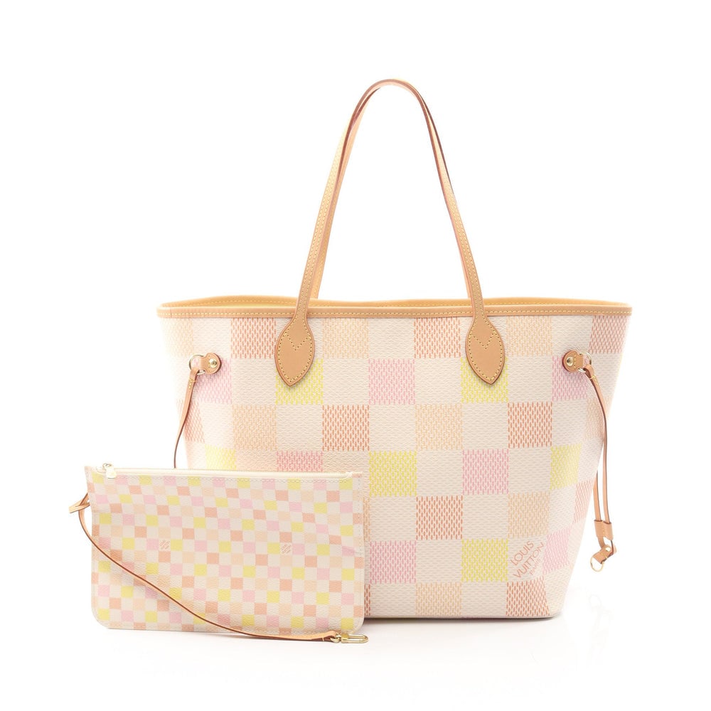 Louis Vuitton Neverfull MM Damiericious: Pink multicolor PVC and leather tote; includes pouch; H29 x W47/32 x D16 cm; strap 50 cm. Authentic and authenticated.