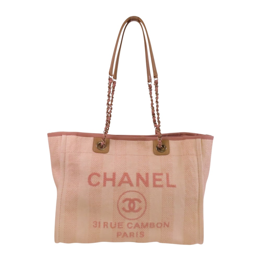 Chanel Deauville MM Pink: Pink canvas Deauville MM shoulder tote with SHW; includes storage bag, hologram sticker, and guarantee; W34-42.5 x H27.5 x D13.5 cm. Authentic and authenticated.