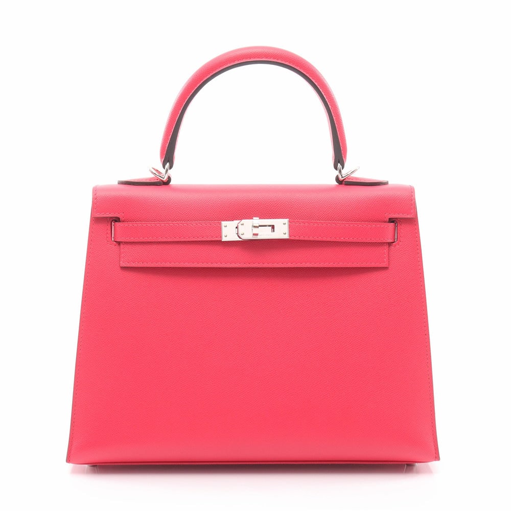 Hermes Kelly 25 Verso Pink: Pink veau epsom outside sewing 2Way handbag with silver hardware. Includes strap padlock keys and crochet. 24.5 x 19 x 9.5 cm.