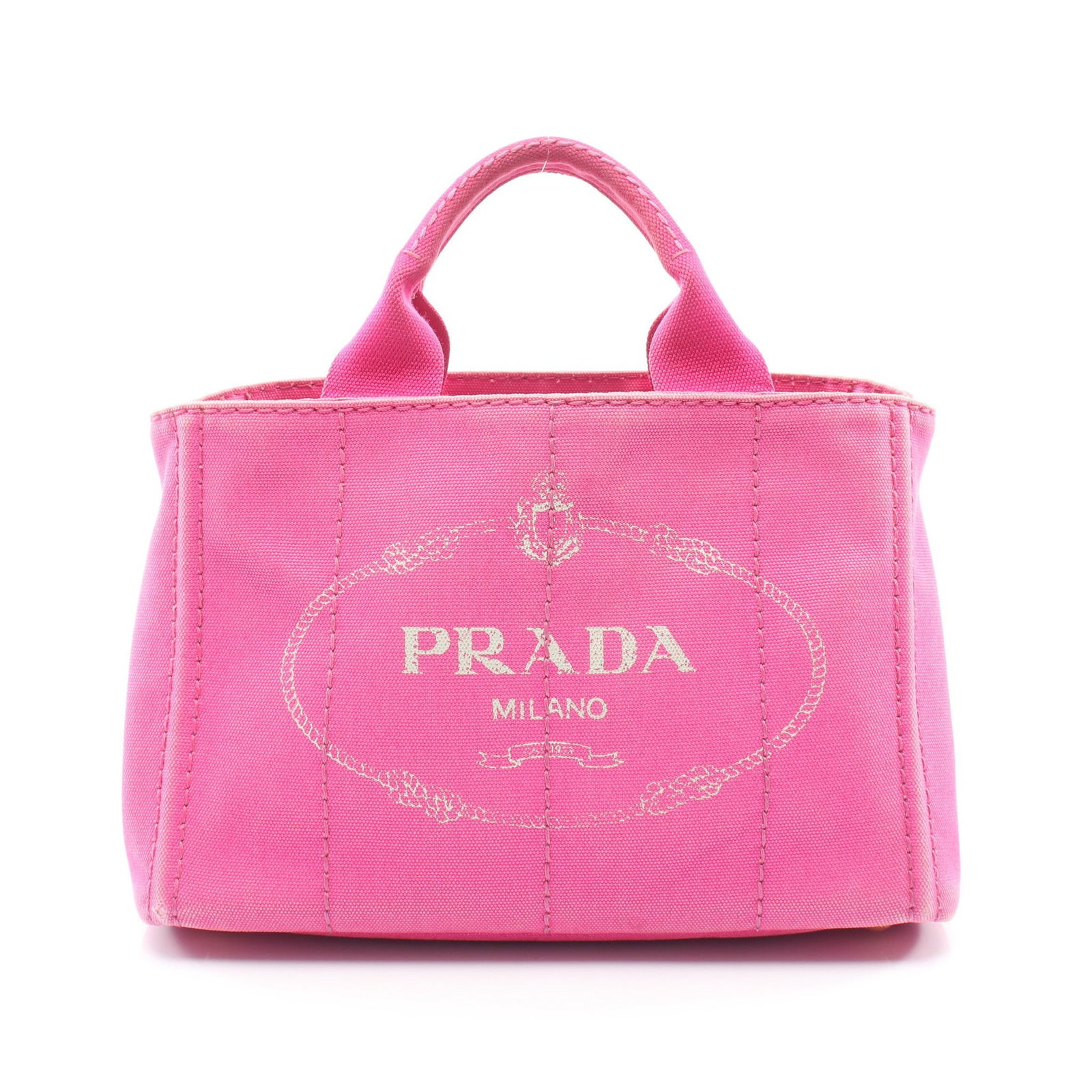 Prada Canapa Mini Canvas Tote Pink: Authentic and authenticated Prada Canapa Mini tote handbag in pink canvas. Model BN2439. Approx. 19H x 26/28W x 15D cm with 26 cm handle. Includes guarantee card with description.
