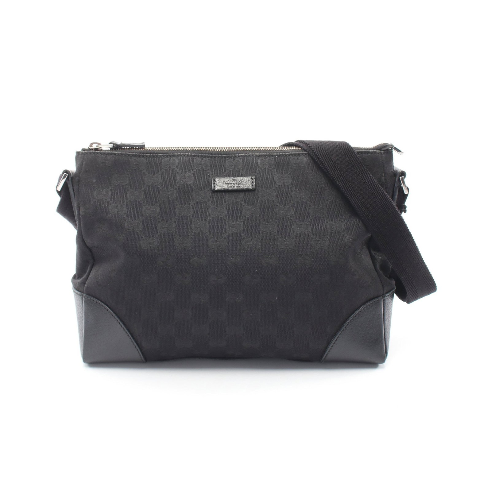 Gucci GG Canvas Shoulder Bag Black: Authentic and authenticated Gucci GG canvas shoulder bag in black canvas and leather. Model 114273. Approx. 21H x 27/28W x 8D cm with 73-136 cm strap. No accessories listed.