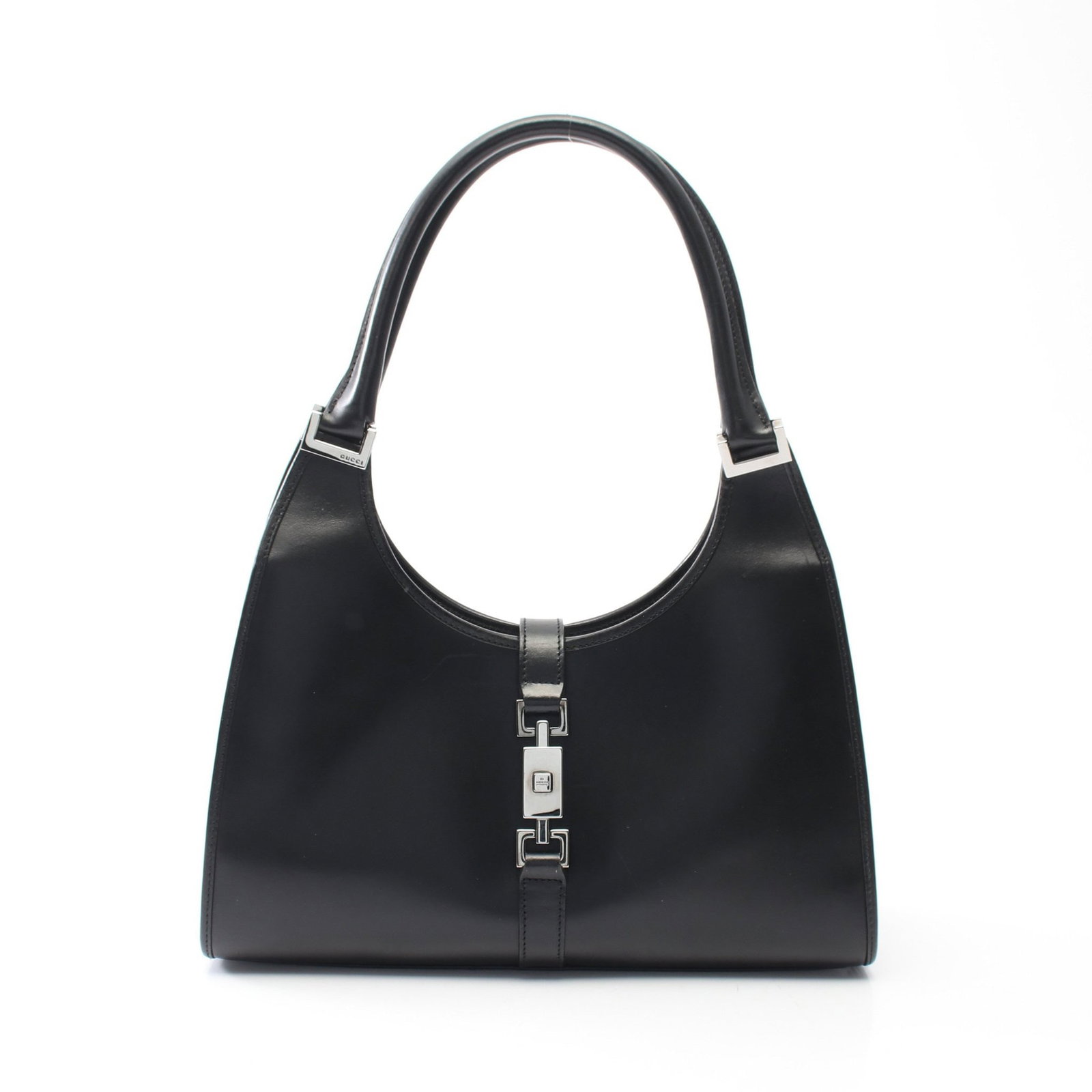 Gucci Jackie Leather Shoulder Bag: Authentic and authenticated Gucci Jackie shoulder bag in black leather. Model 002 1067. Approx. 16H x 27/31W x 9D cm with 38 cm strap and 22 cm max drop.