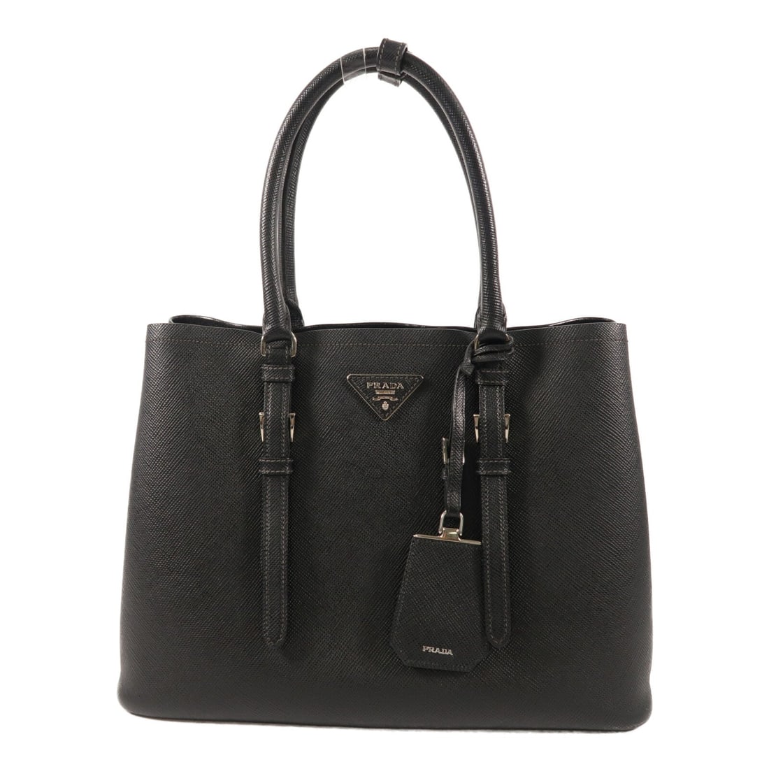 Prada Saffiano Cuir Double Bag: Authentic and authenticated Prada Saffiano Cuir Double hand bag in black calfskin. Product no. 25. Approx. 35W x 24.5H x 15.5D cm with 44 cm handle. Includes name tag.