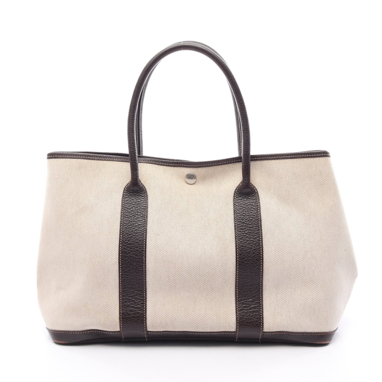 Hermes Garden Party PM Beige Brown: Authentic and authenticated Hermes Garden Party PM tote handbag in beige and dark brown Toile H canvas and Negonda leather with silver hardware. Approx. 25H x 36W x 17D cm with 44 cm handle. ?H stamp.
