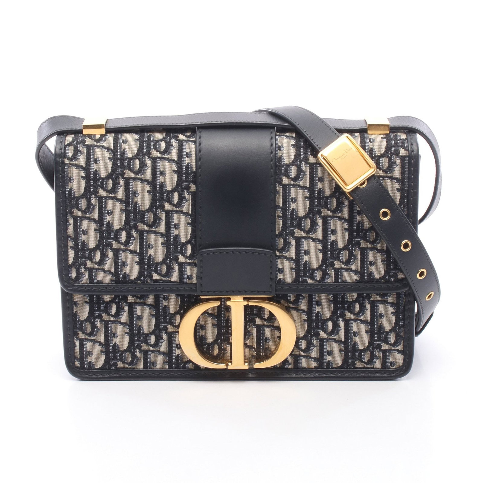 Dior 30 Montaigne Oblique Bag: Authentic and authenticated Christian Dior 30 Montaigne Oblique shoulder bag in navy and beige canvas leather. Model M9203UTZQ-M928. Approx. 17H x 24W x 6D cm with 97-107 cm strap.