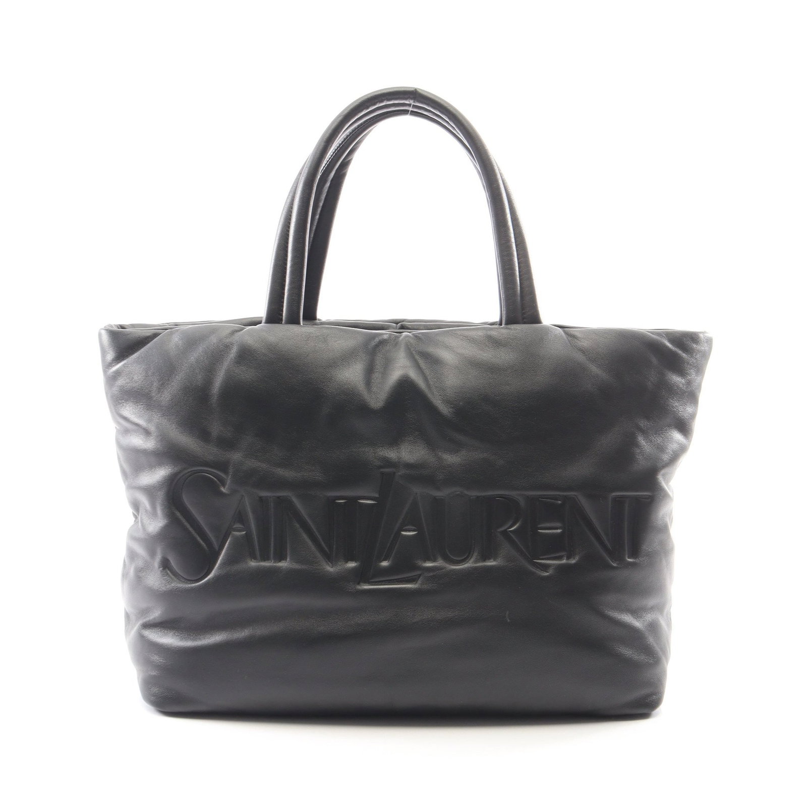Saint Laurent Wide Puffer Tote: Authentic and authenticated Saint Laurent Paris Wide Puffer tote handbag in black leather. Model 756269. Approx. 35H x 56/41W x 16D cm with 49 cm handle.