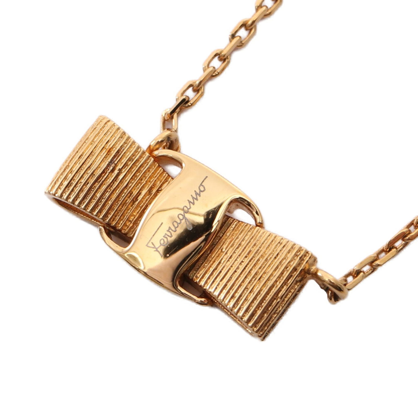 Ferragamo Vara Ribbon Necklace: Vara ribbon necklace in gold plated finish.