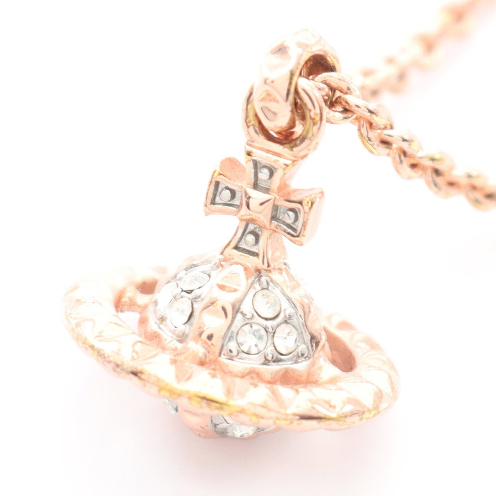 Vivienne Orb Necklace Pink Gold: Orb necklace in pink gold tone with clear rhinestones.