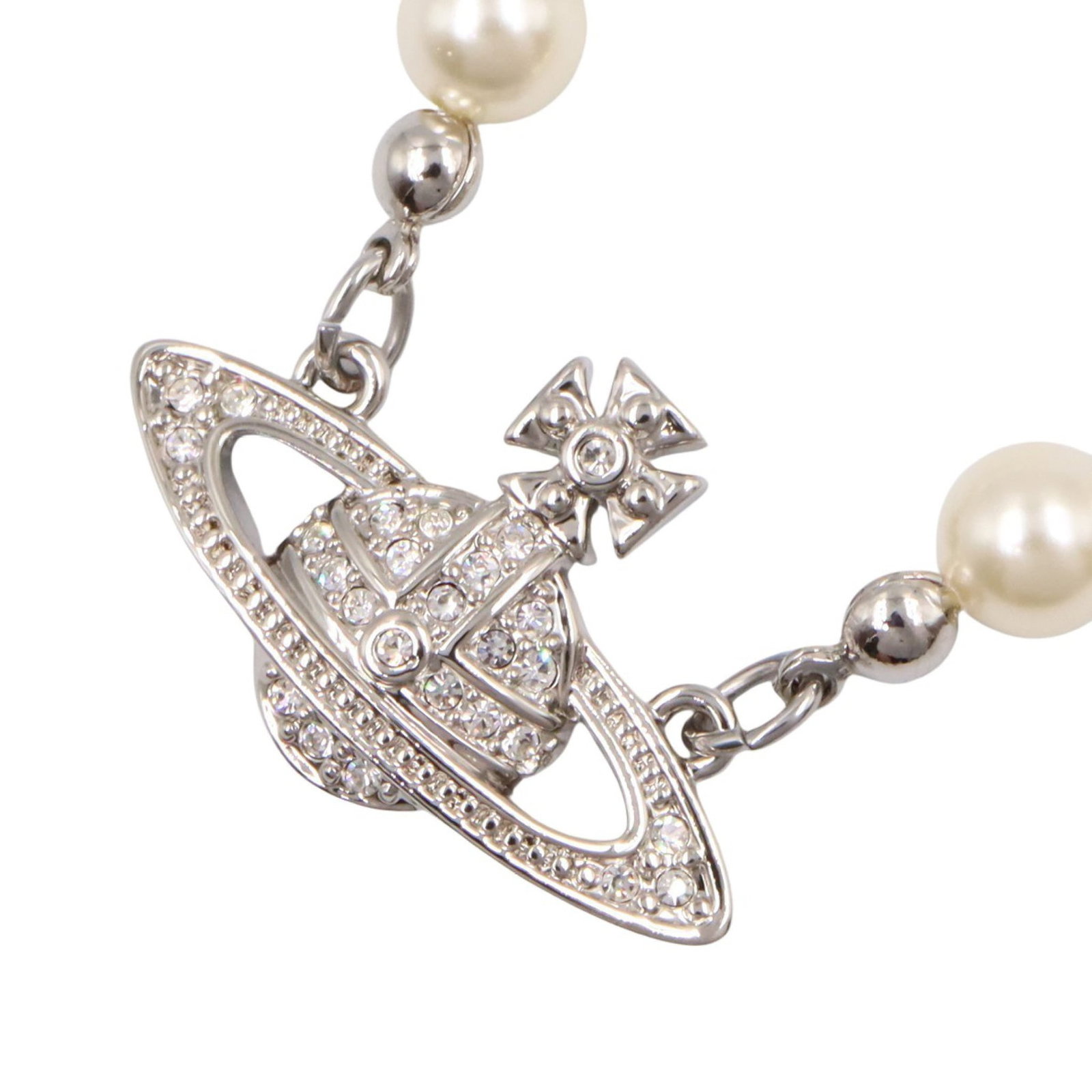 Vivienne Pearl Bas Relief Necklace: MINI BAS RELIEF PEARL necklace in silver tone with rhinestone and fake pearl.