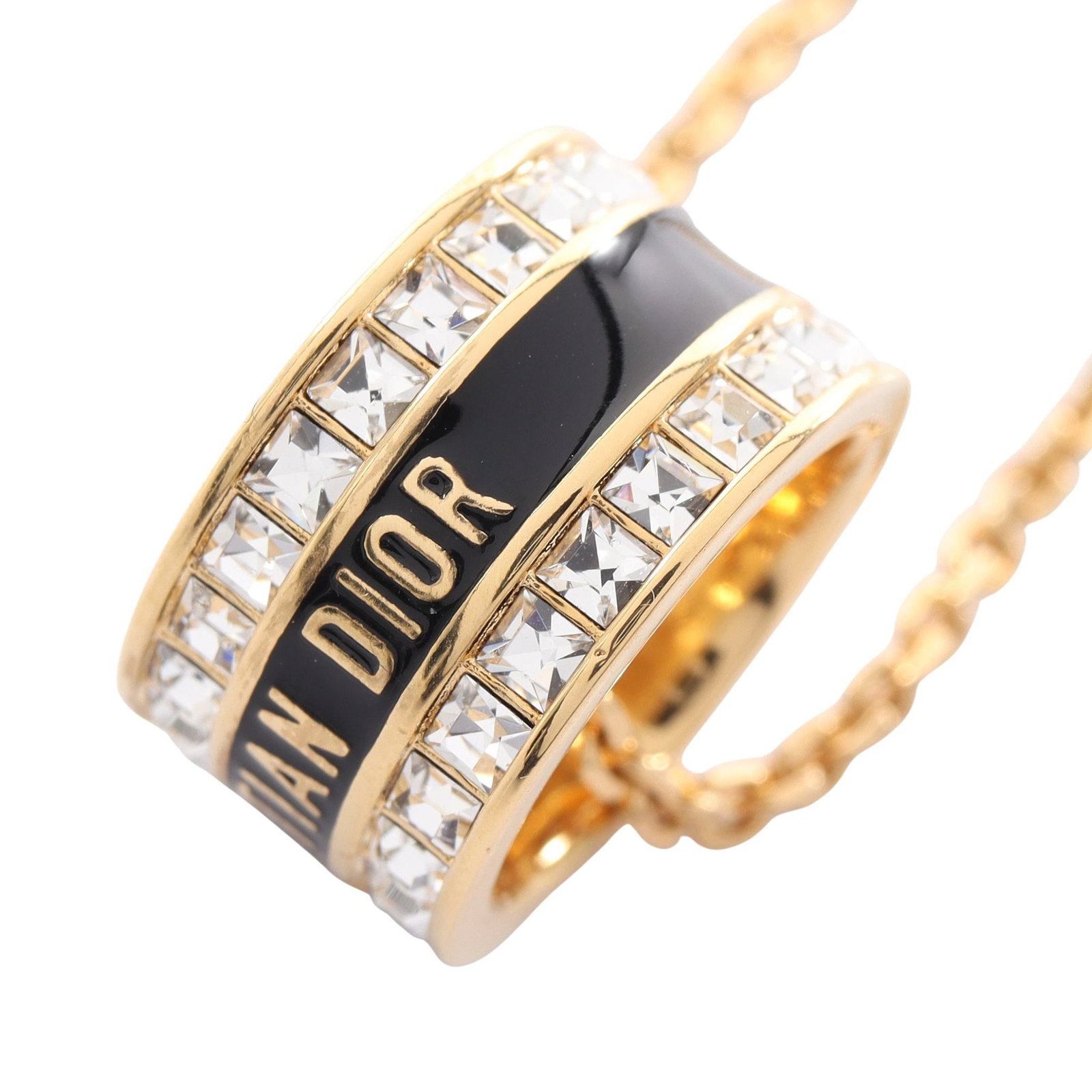 Dior Night Code Necklace: Dior Night Code necklace in gold plated finish with black and clear rhinestones.