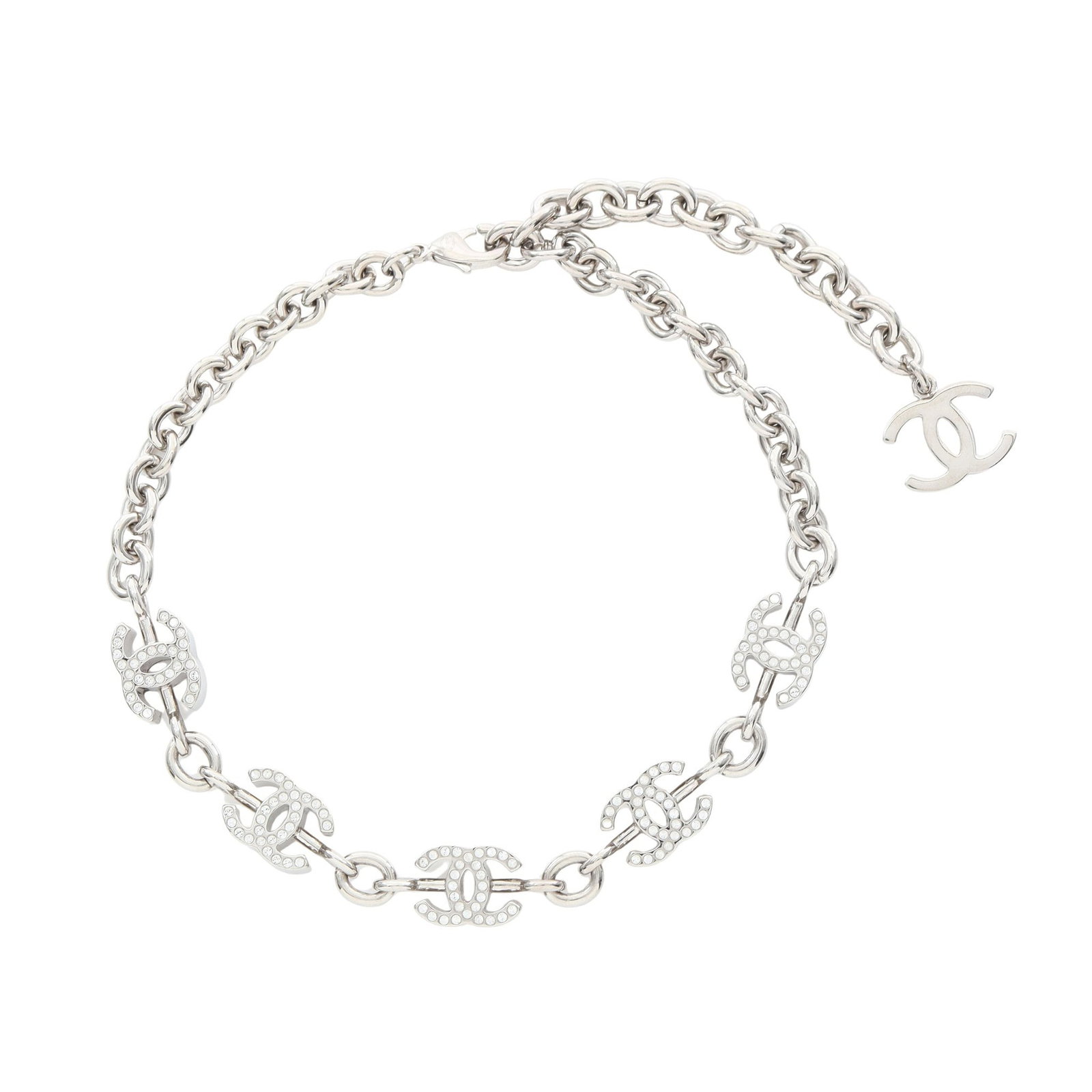 Chanel Coco Mark Rhinestone Silver: Coco Mark necklace in silver tone with clear rhinestones.