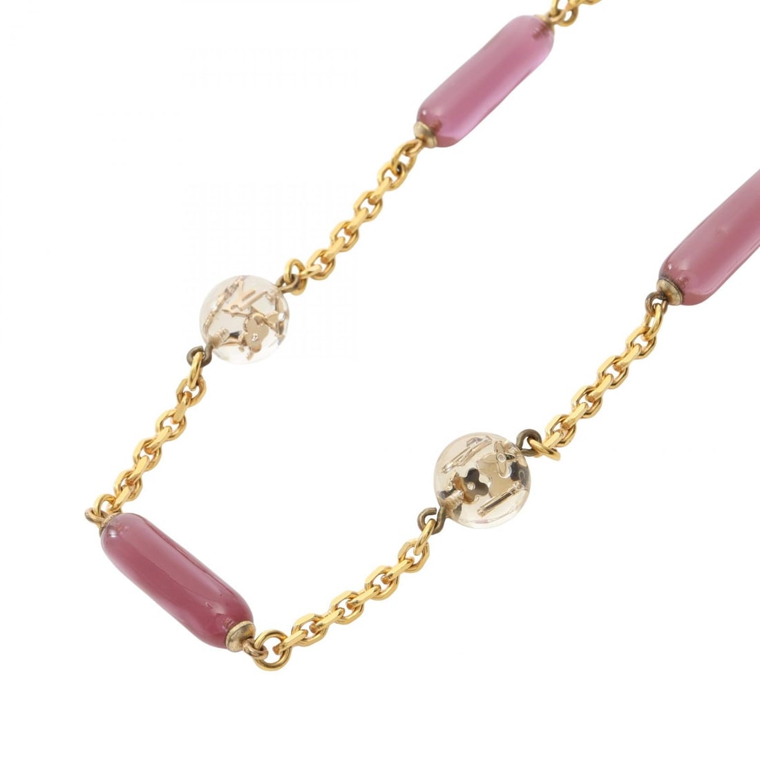 Louis Vuitton Vert Inclusion Necklace: Sautoir Vert Inclusion necklace in gold plated resin with pink purple and clear tone.