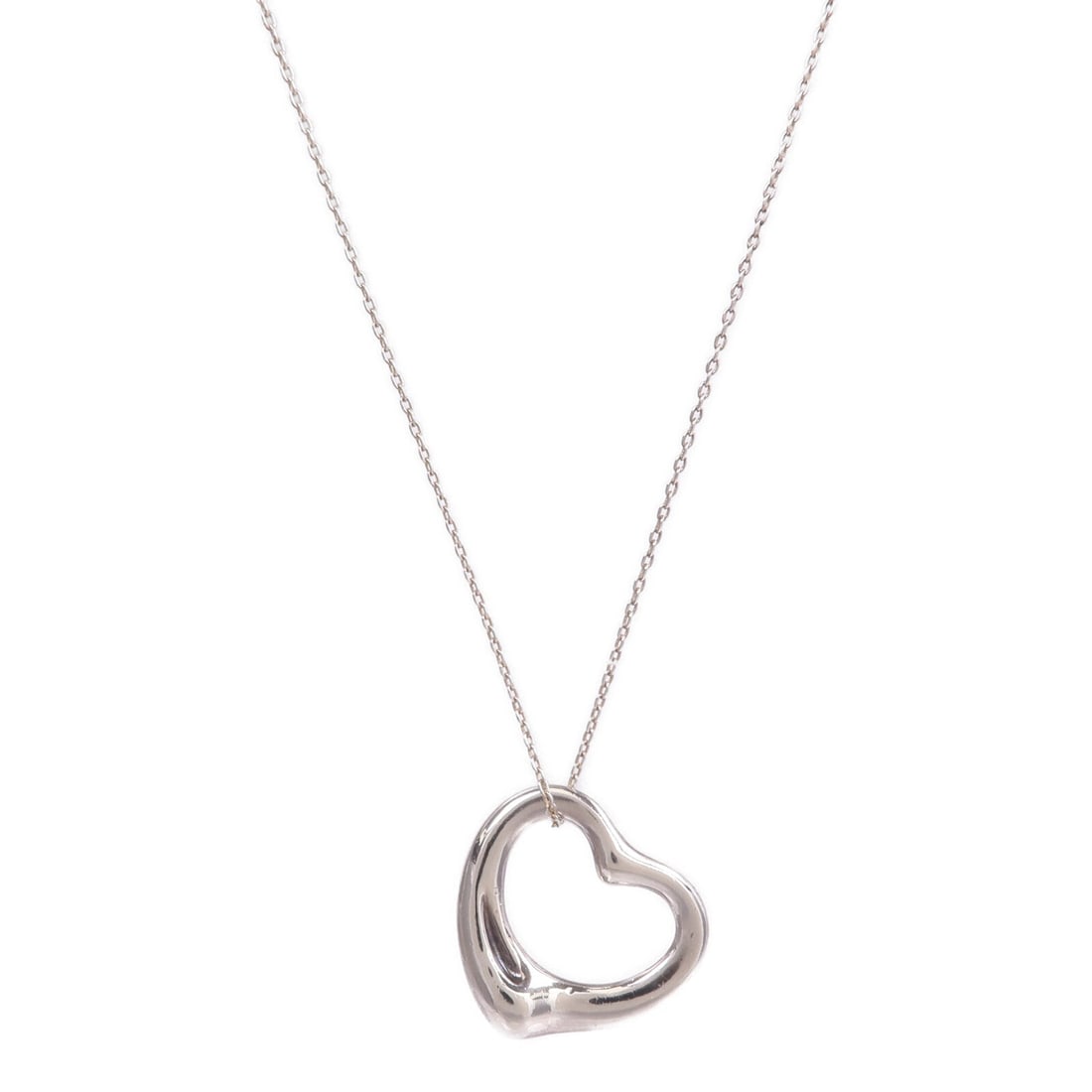 Tiffany Open Heart Necklace Silver: Elsa Peretti Open Heart necklace in 925 sterling silver.