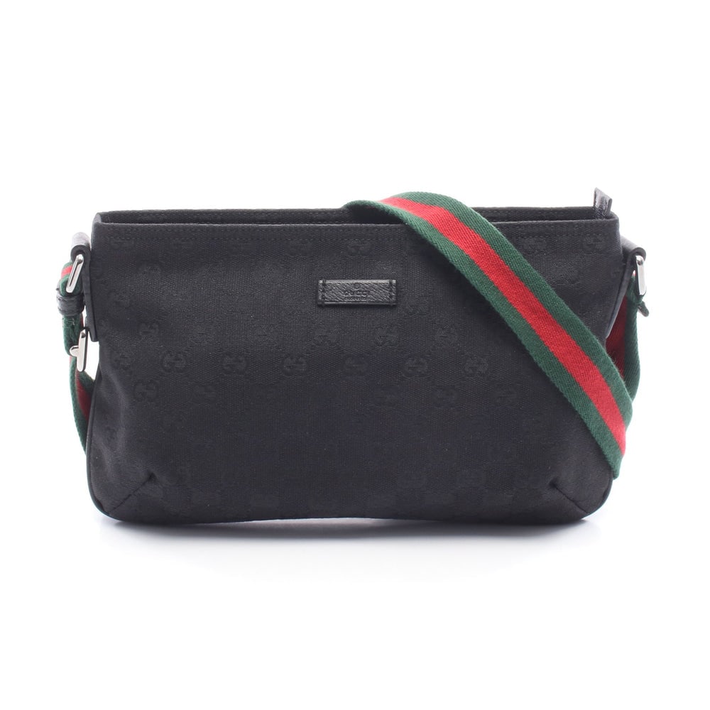 Gucci Sherry GG Canvas Shoulder Bag: Authenticated genuine Gucci Sherry line GG canvas shoulder bag in black canvas and leather, model 189749. Approx. H18.5 x W27 top/29 base x D3 cm with 67-124 cm strap. No accessories listed.