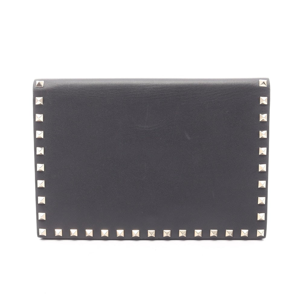 Valentino Rockstud Clutch Black: Valentino Garavani Rockstud Clutch Bag. Color: Black. Material: Leather. Size: 24 X 16.5 X 0.5 Cm. Includes: Pouch.