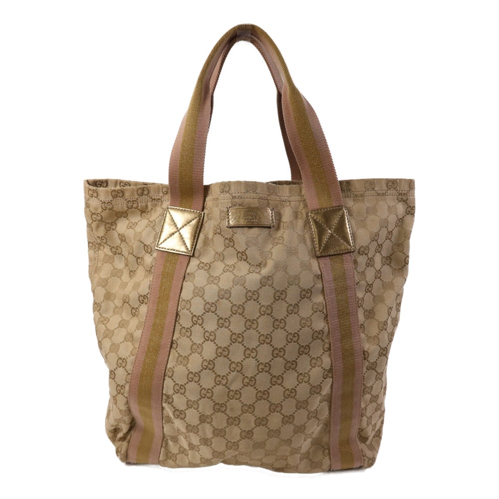 Gucci Gg Tote Bag Brown: Gucci Gg Tote Bag. Color: Brown / Brown. Material: Gg Canvas. Size: 32 X 35.5 X 12.5 Cm. Handle: 40 Cm.