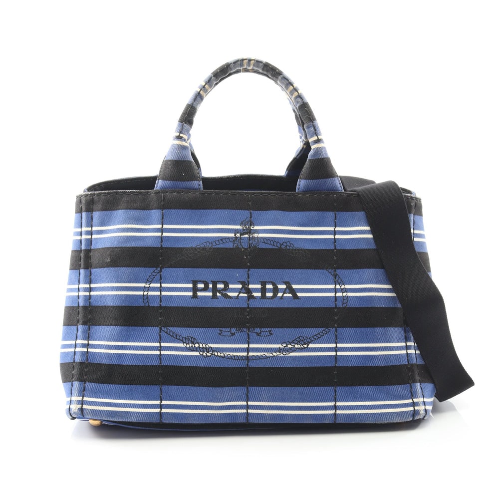 Prada Canapa Striped 2Way: Prada Canapa Kanapa Handbag Tote Bag 2Way. Color: Blue Black White. Material: Canvas. Size: 36/35 X 23 X 22 Cm. Handle: 34 Cm. Strap: 75-127 Cm. Includes: Shoulder Strap.
