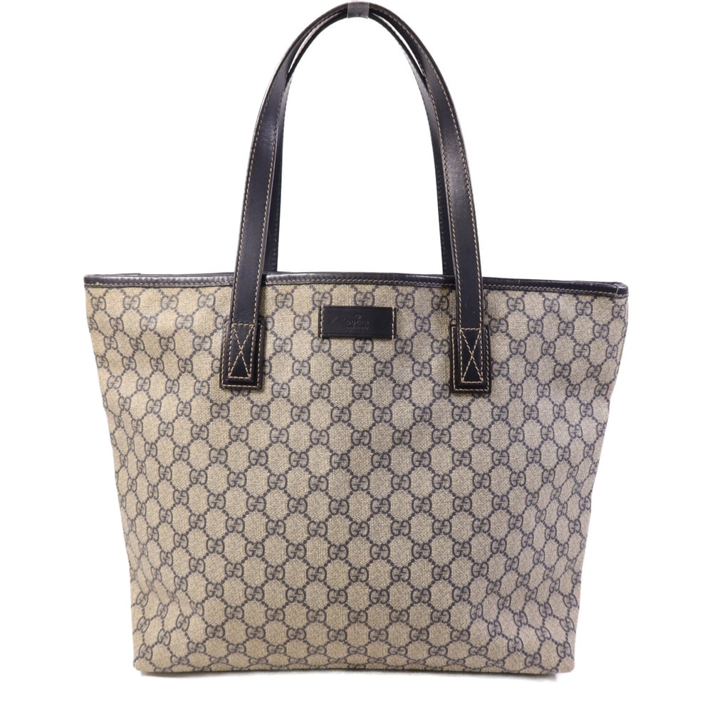 Gucci Beige Coated Canvas Tote Bag: Authentic and authenticated Gucci tote bag in beige PVC coated canvas. Product no. 213048. Approx. 32W x 30H x 12D cm with 52 cm handle. No accessories listed.