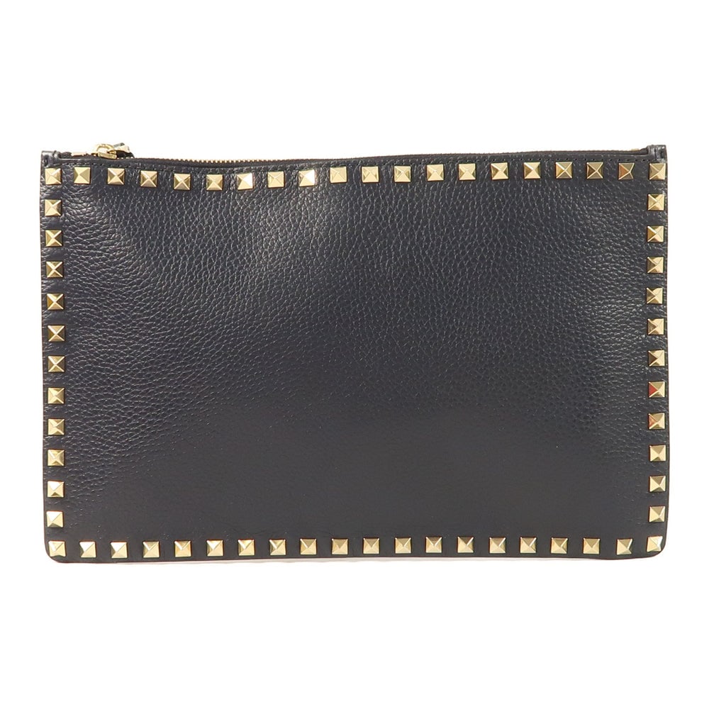 Valentino Rockstud Clutch Navy: Navy calfskin clutch pouch. Includes storage bag. 30 x 20 x 1 cm.