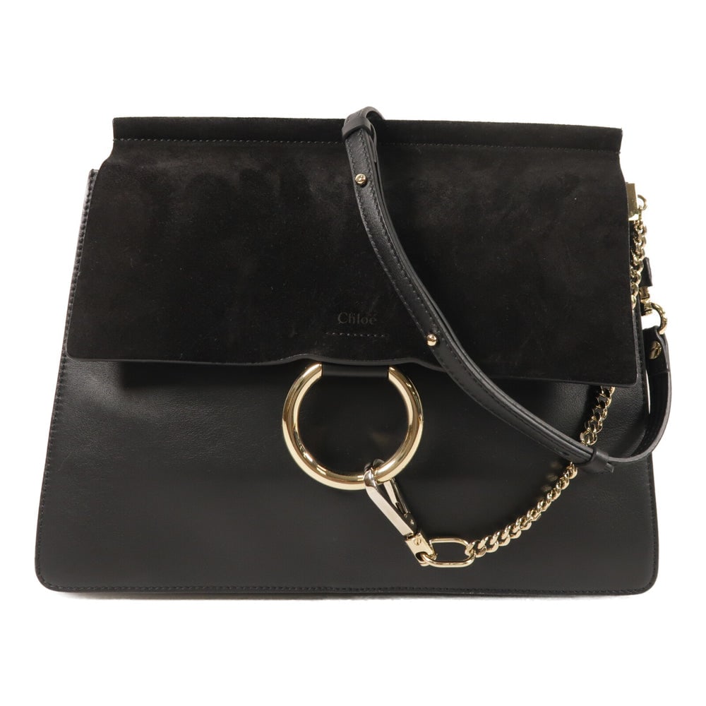 Chloe Faye 2 Way Shoulder Bag Black: Authentic and authenticated Chloe Faye 2 way shoulder bag in black suede and calfskin. Product no. 02.17.63.65. Approx. 32W x 25H x 2D cm with 92 cm shoulder strap. Includes storage bags and shoulder