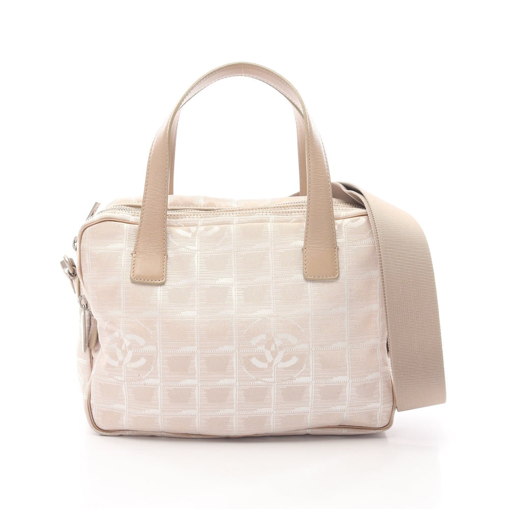 Chanel Nylon 2Way Handbag Beige: Chanel Handbag 2Way. Color: Beige. Material: Nylon Canvas Leather. Size: 24/24.5 X 18.5 X 2/7 Cm. Handle: 37 Cm. Strap: 77-131 Cm. Includes: Guarantee Card, Serial Seal, Shoulder Strap.