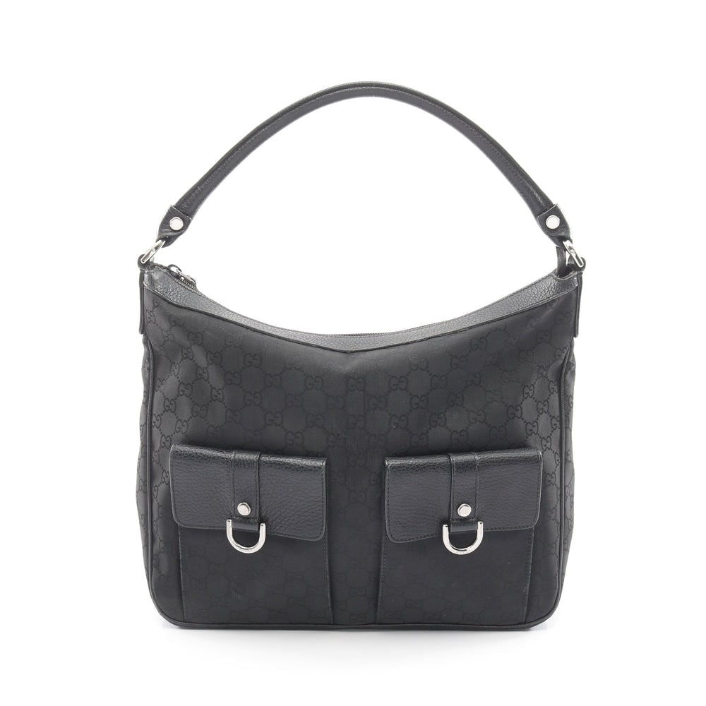 Gucci GG Nylon One Shoulder Bag: Authentic and authenticated Gucci GG nylon one shoulder bag in black nylon and leather. Model 293581. Approx. 25H x 34/31W x 10.5D cm with 43 cm strap.