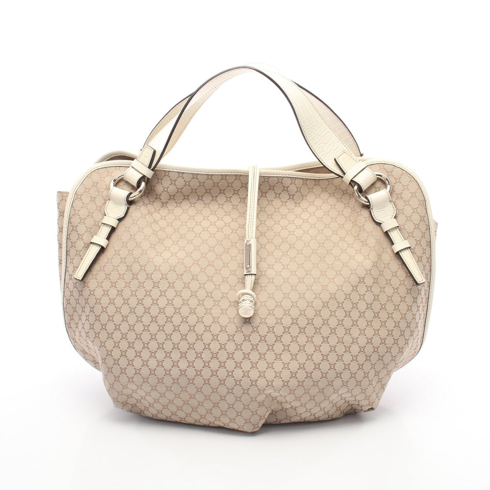 Celine Macadam Croc Embossed Tote: Authentic and authenticated Celine Macadam tote handbag in beige and ivory croc embossed PVC leather. Approx. 35H x 46/33W x 19D cm with 48 cm handle. No accessories listed.