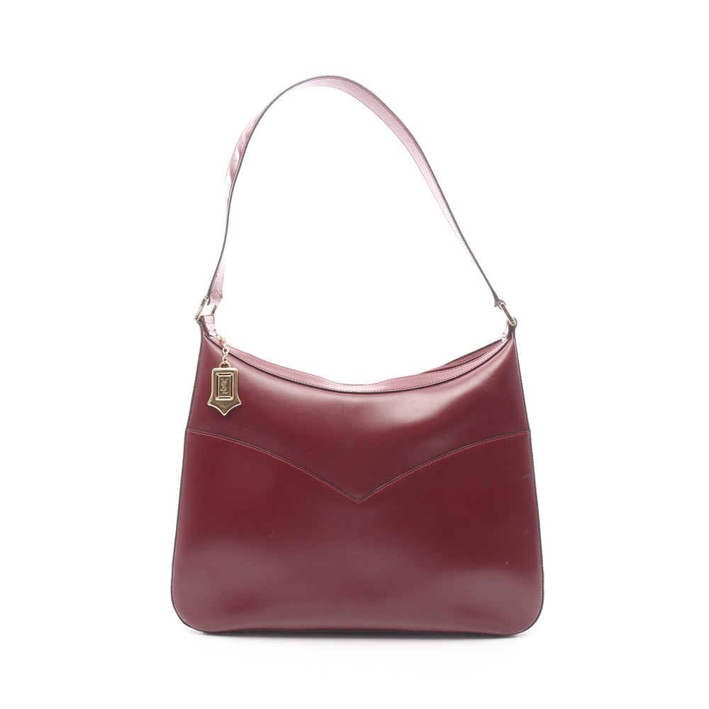 YSL Bordeaux Leather One Shoulder: Authentic and authenticated Yves Saint Laurent one shoulder bag in bordeaux leather. Approx. 25H x 32/38W x 11D cm with 62 cm strap and 30 cm max drop.