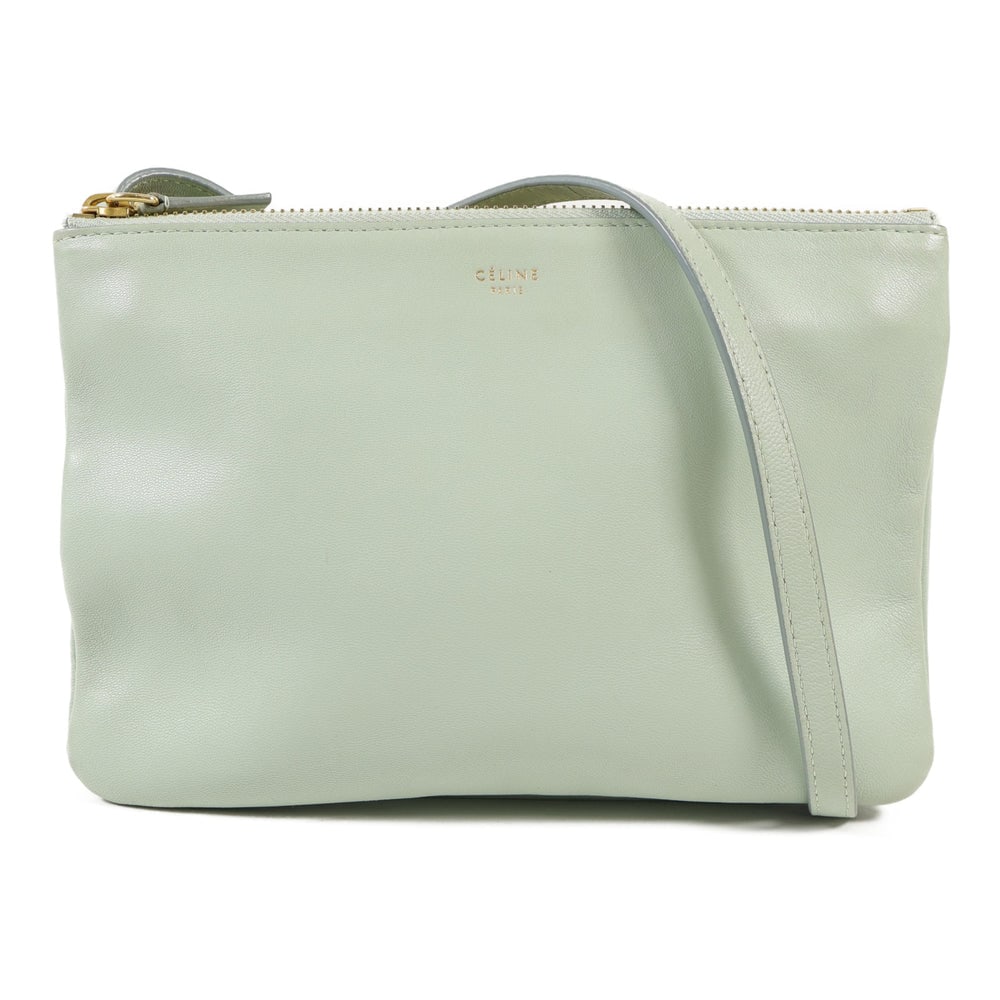 Celine Trio Small Shoulder Bag Green: Authentic and authenticated Celine Trio Small shoulder bag in green lambskin. Product no. W-GA-2178. Approx. 21.5W x 14H x 2.5D cm with 110 cm shoulder strap. Includes storage bags.