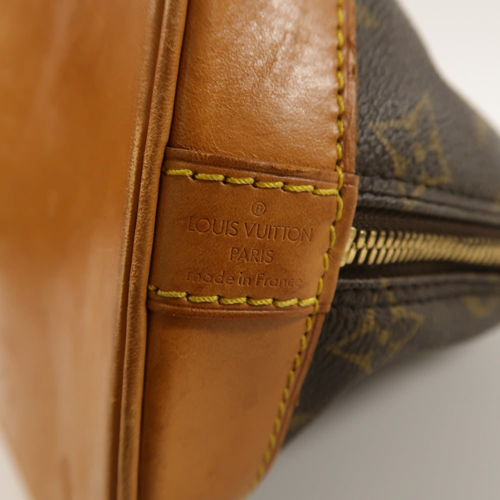 Louis Vuitton Alma Monogram Handbag - 6