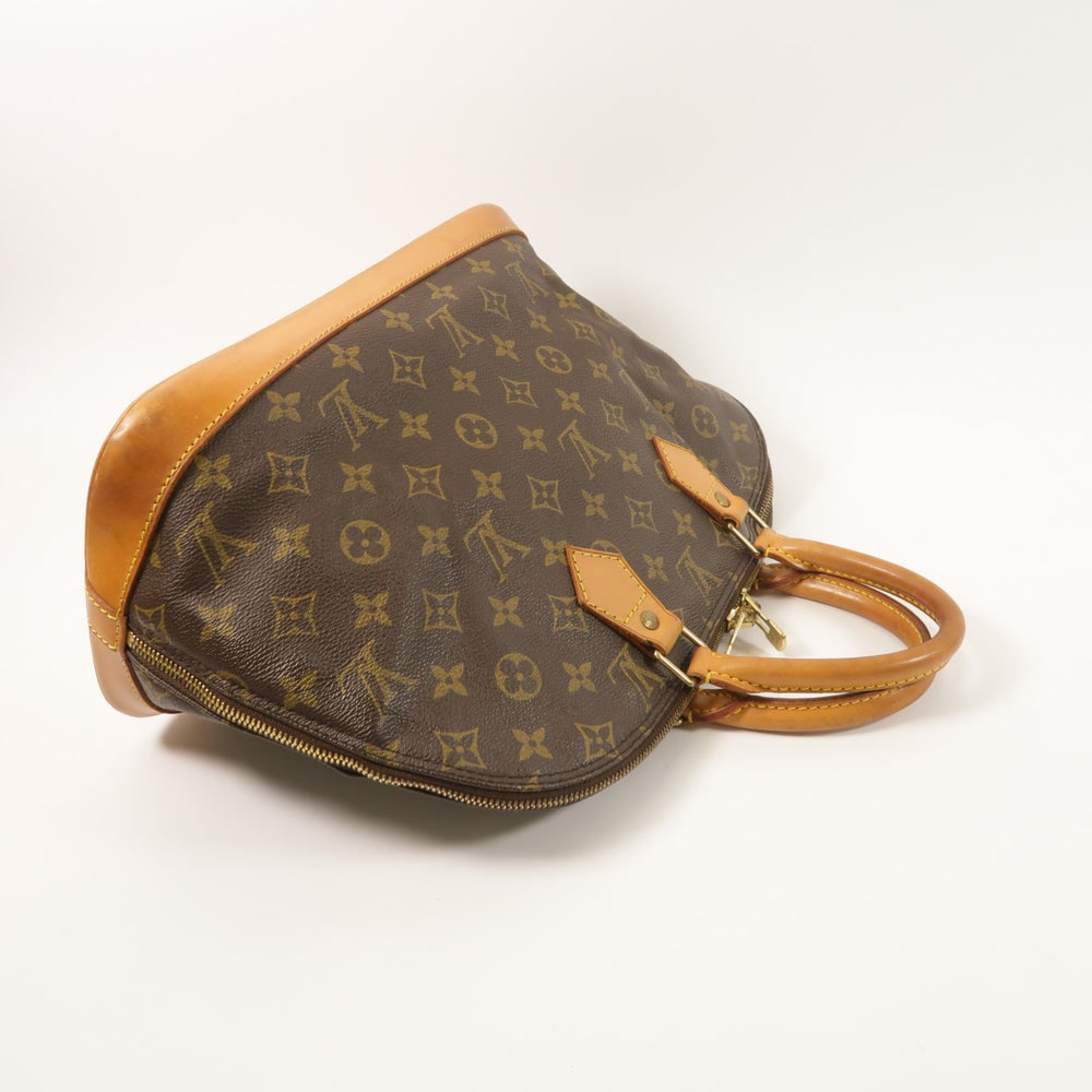 Louis Vuitton Alma Monogram Handbag - 8