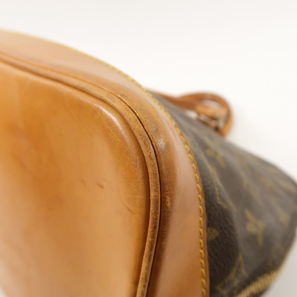 Louis Vuitton Alma Monogram Handbag - 9