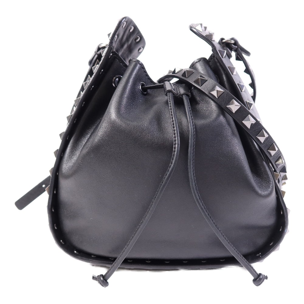 Valentino Bucket Shoulder Bag Black: Authentic and authenticated Valentino bucket shoulder bag in black calfskin. Product no. TM-M178VB42. Approx. 21W x 22H x 7D cm with 109-119 cm shoulder strap.