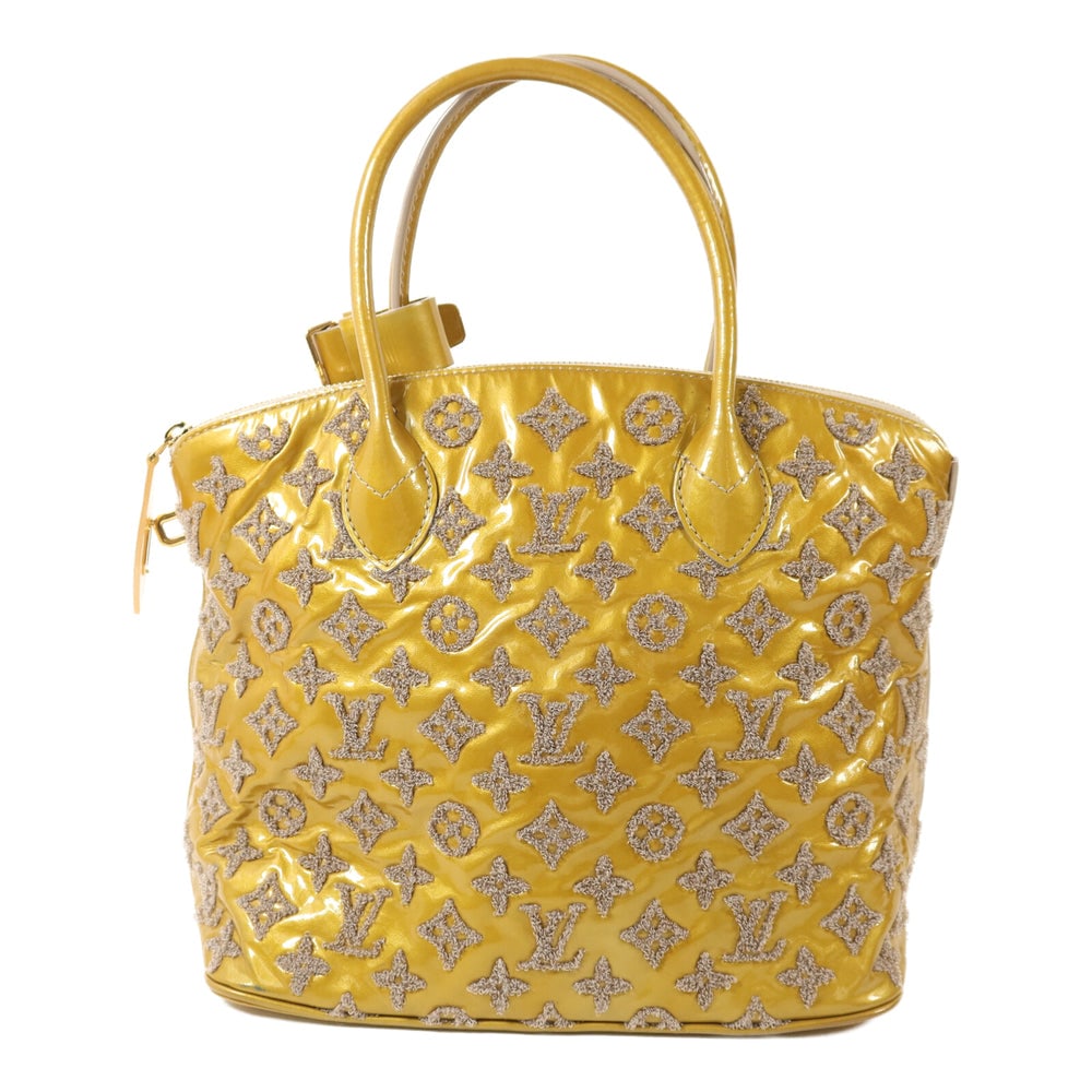 Louis Vuitton Lockit Fascination Bag: Authenticated genuine Louis Vuitton Lockit handbag in yellow beige Monogram Fascination patent leather with gold-tone hardware. Product no. TJ4151. Approx. W28-33 x H26.5 x D15.5 cm with 40 cm handle.