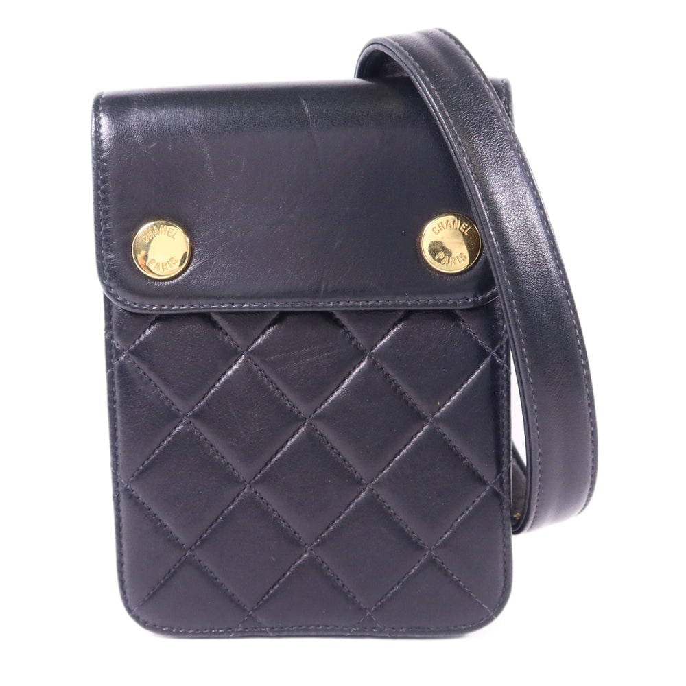 Chanel Lambskin Waist Bag Black: Black lambskin waist body bag. Includes hologram sticker. 11 x 3 cm.